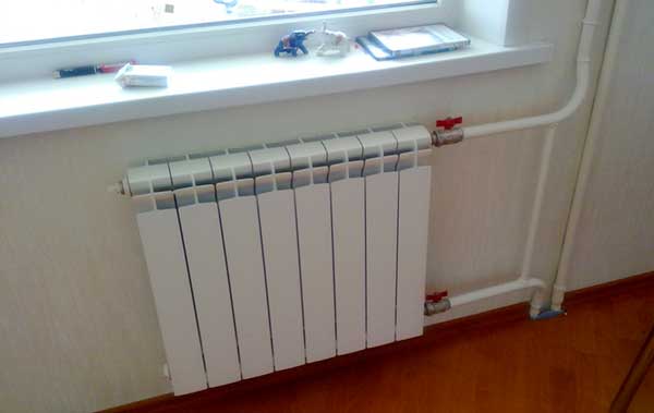 Bimetál radiátorok telepítve a lakásban