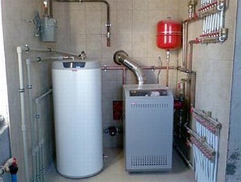 Double-circuit boiler with a boiler connected to the system