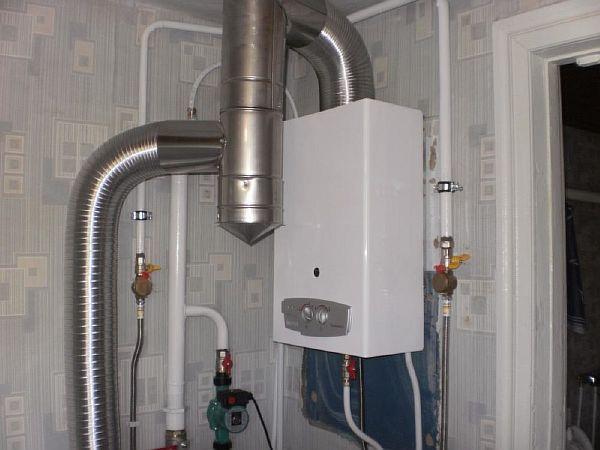 Photo - connecting a wall-mounted gas boiler with a corrugation
