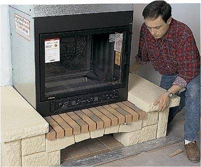 So installieren Sie einen Kaminofen in einem Holzhaus