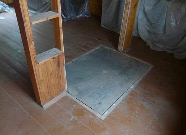 cómo instalar una estufa de hierro en una casa de madera