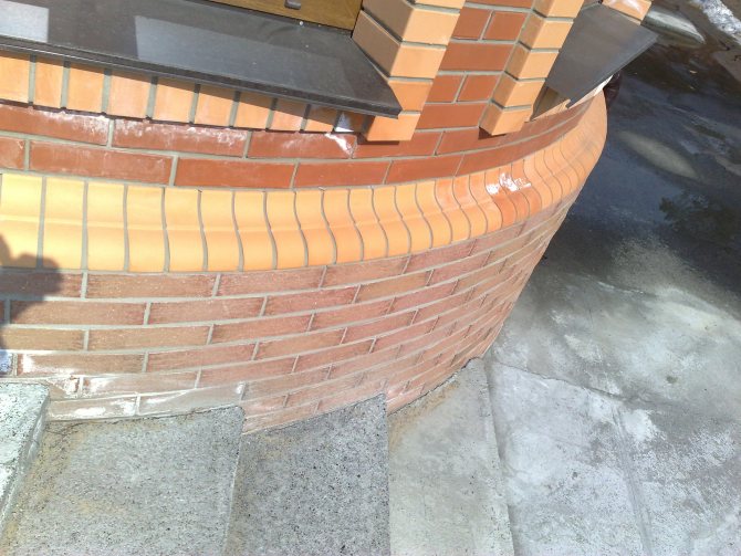 Brick on a plinth