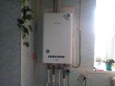 Wall-mounted boiler Navien in the kitchen