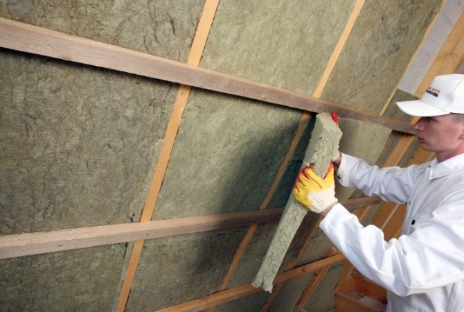 Mineral wool slabs with synthetic binder