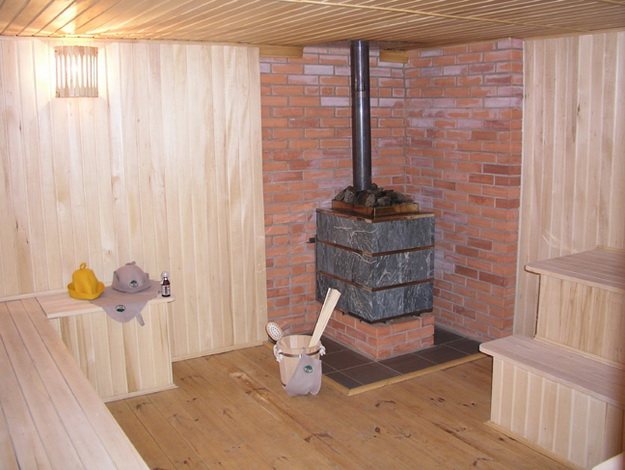 Correct installation of the stove in the sauna on a wooden floor 3