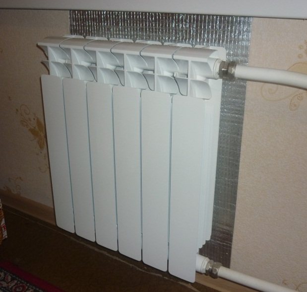 Conservación de la transferencia de calor mediante aislamiento de láminas.