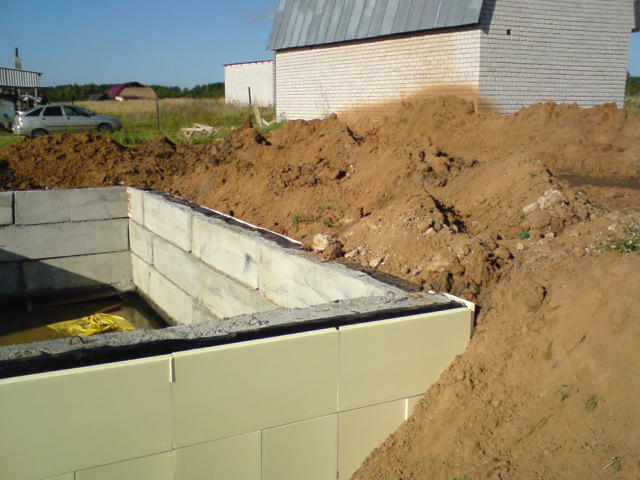 Basement walls are insulated with extruded polystyrene foam plates