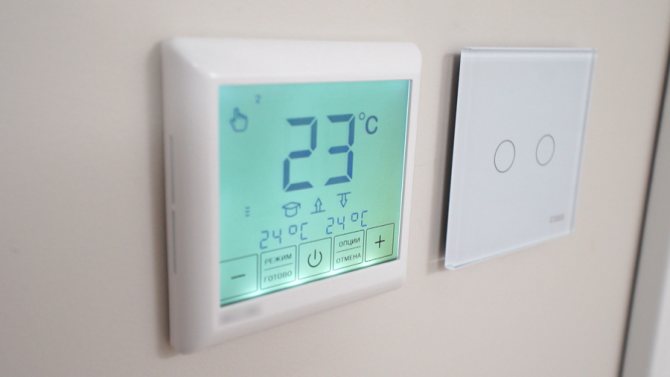 The thermostat allows you to control an infrared heated floor by setting the desired temperature