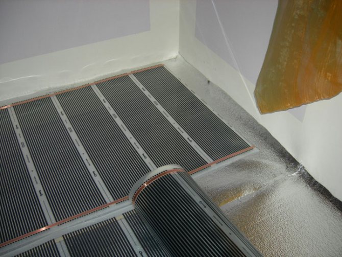 Infraraudonųjų spindulių grindų šildymo įrengimas