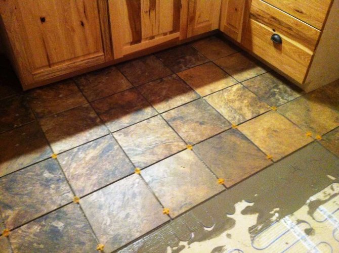 laying tiles on an electric warm floor
