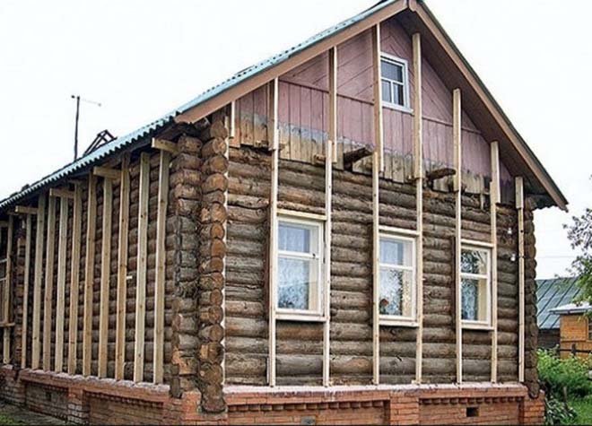 Изолация на фасадата на дървена къща отвън