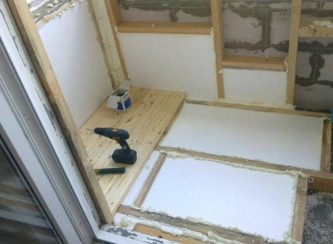 insulation of walls and floors on the balcony with polystyrene foam